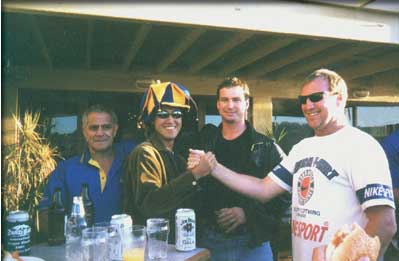 A guy on left is boat's sweep who control the direction of the boat and also encrouge paddlers. A guy in the middle and next to me is a coach. A guy who is wearing a fancky hut is Chikara, was about be drunk.